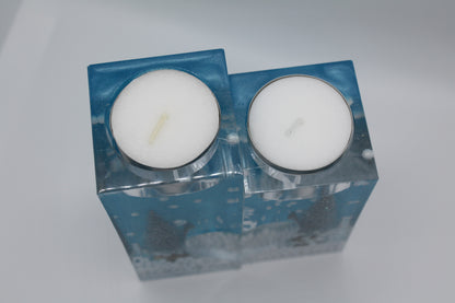 christmas themed candle holder pair